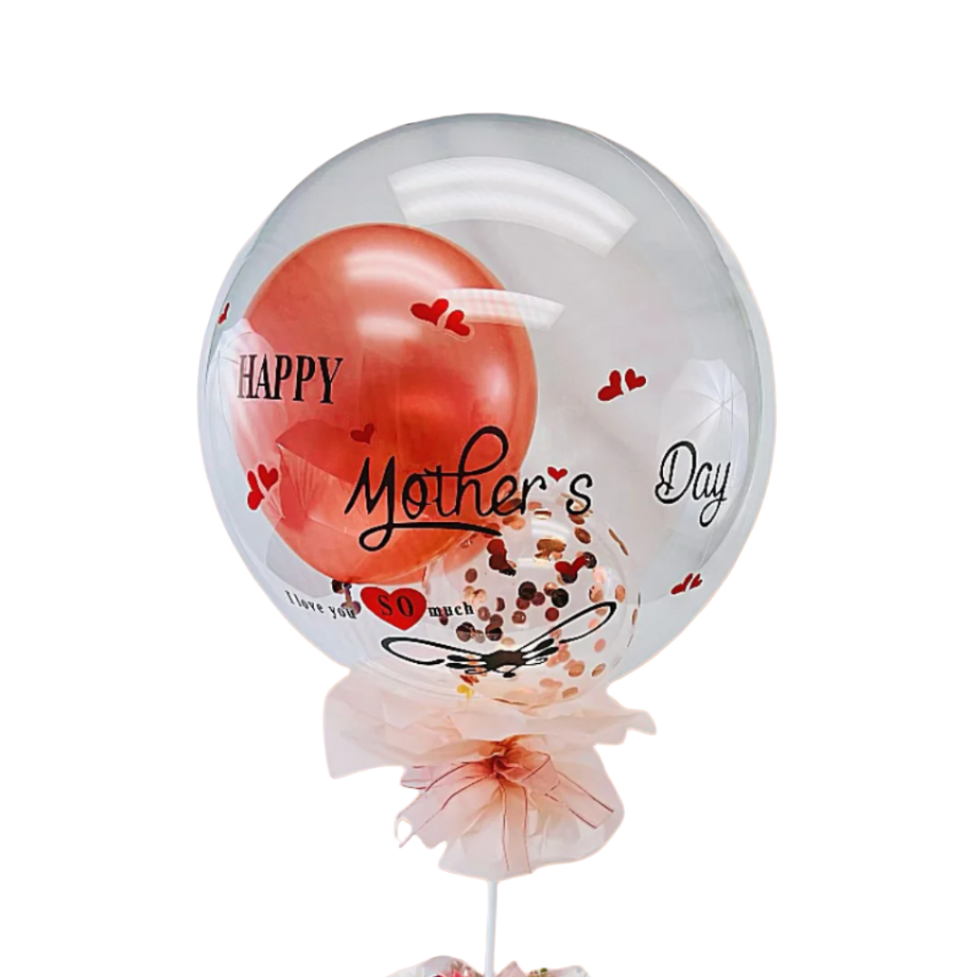 Clear BoBo balloon with "Happy Mother's Day" letter sticker, filled with a red balloon, confetti, and tied with a pink ribbon.