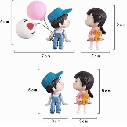 Size: 6cm x 7 cm and 5cm x 3 cm Size guide for couple figurines with balloons, displaying height and width in centimeters.